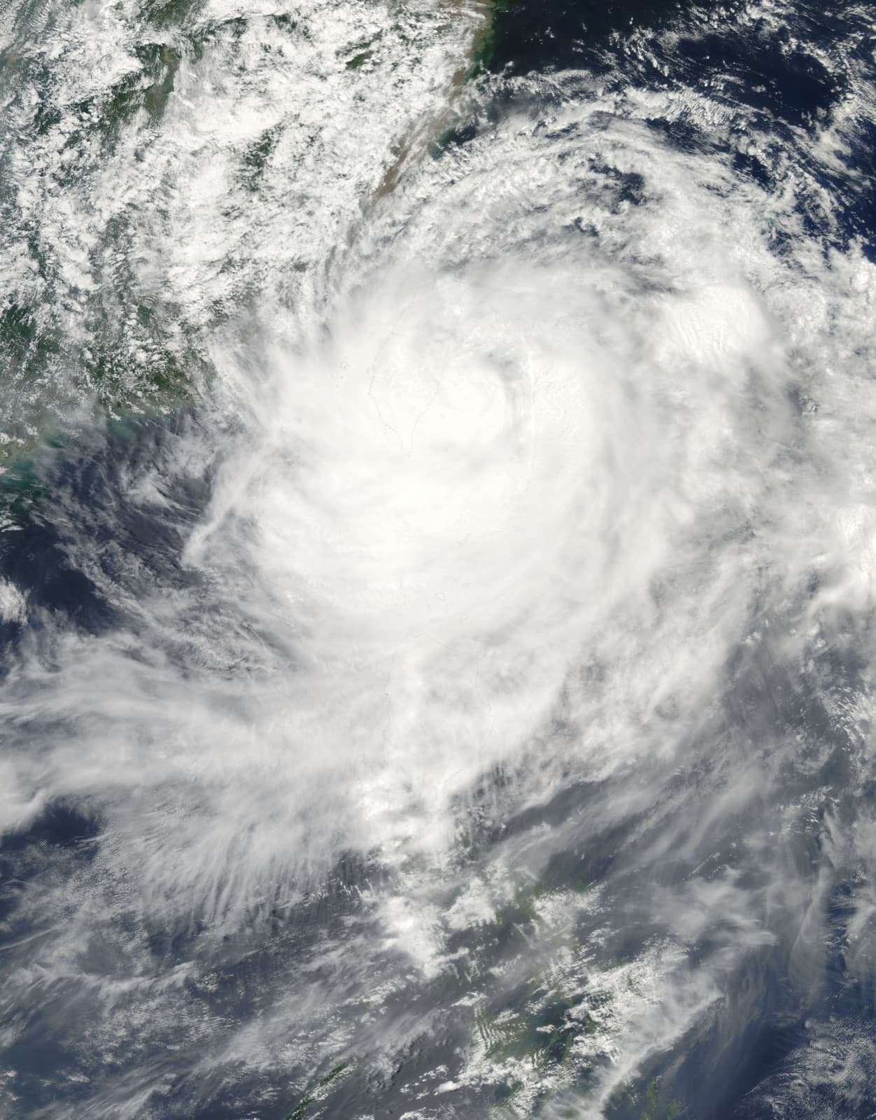 Typhoon Morakot on 7 August 2009, its cloud mass over the whole island. The winds were unremarkable; the rain was not — nearly 3,000 millimetres fell on the southern mountains in three days.