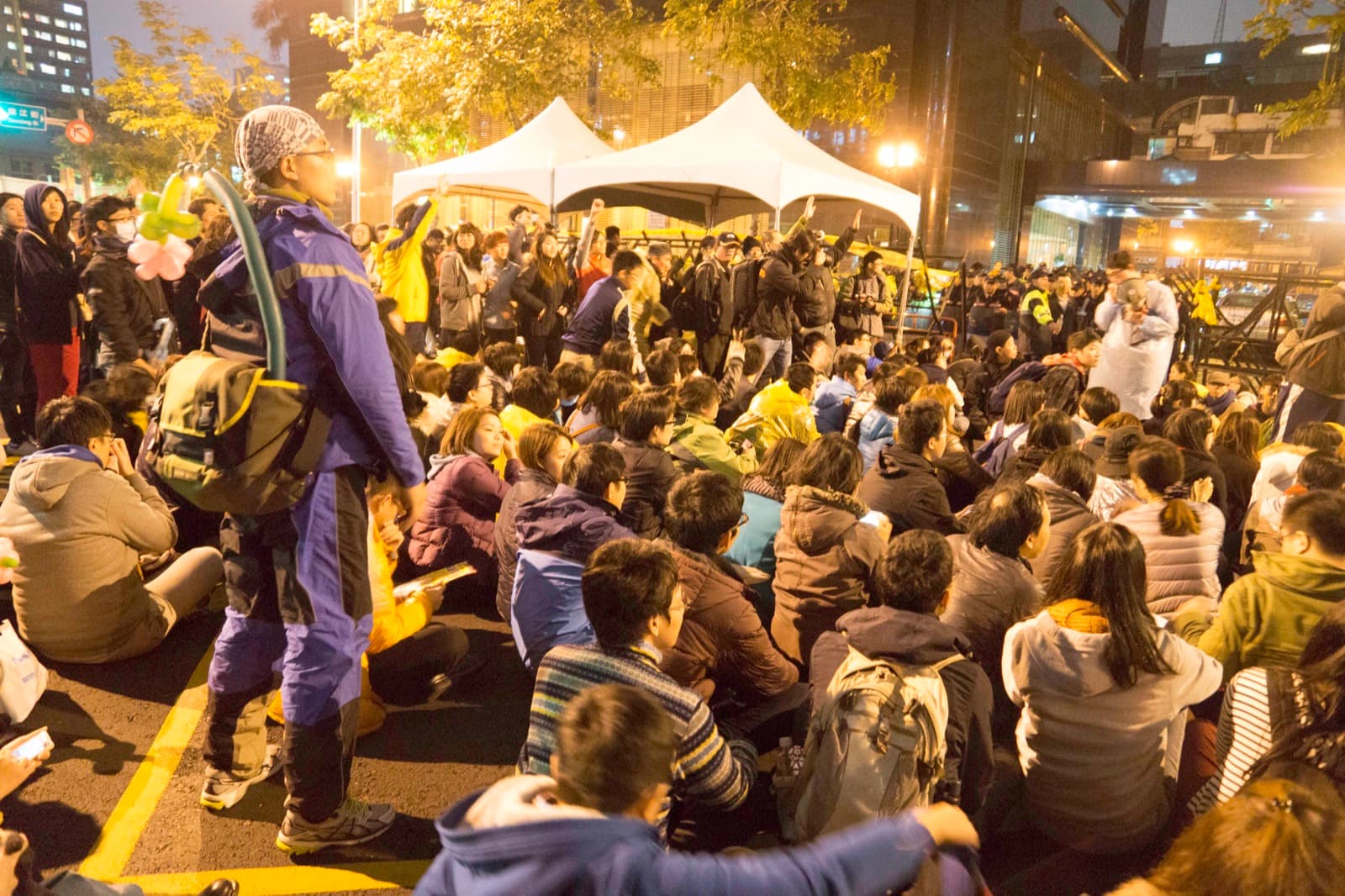 The sit-in outside the Legislative Yuan, March 2014. Students held the chamber for twenty-four days after the cross-strait services trade agreement was pushed through committee in thirty seconds. Outside, people kept watch in shifts.