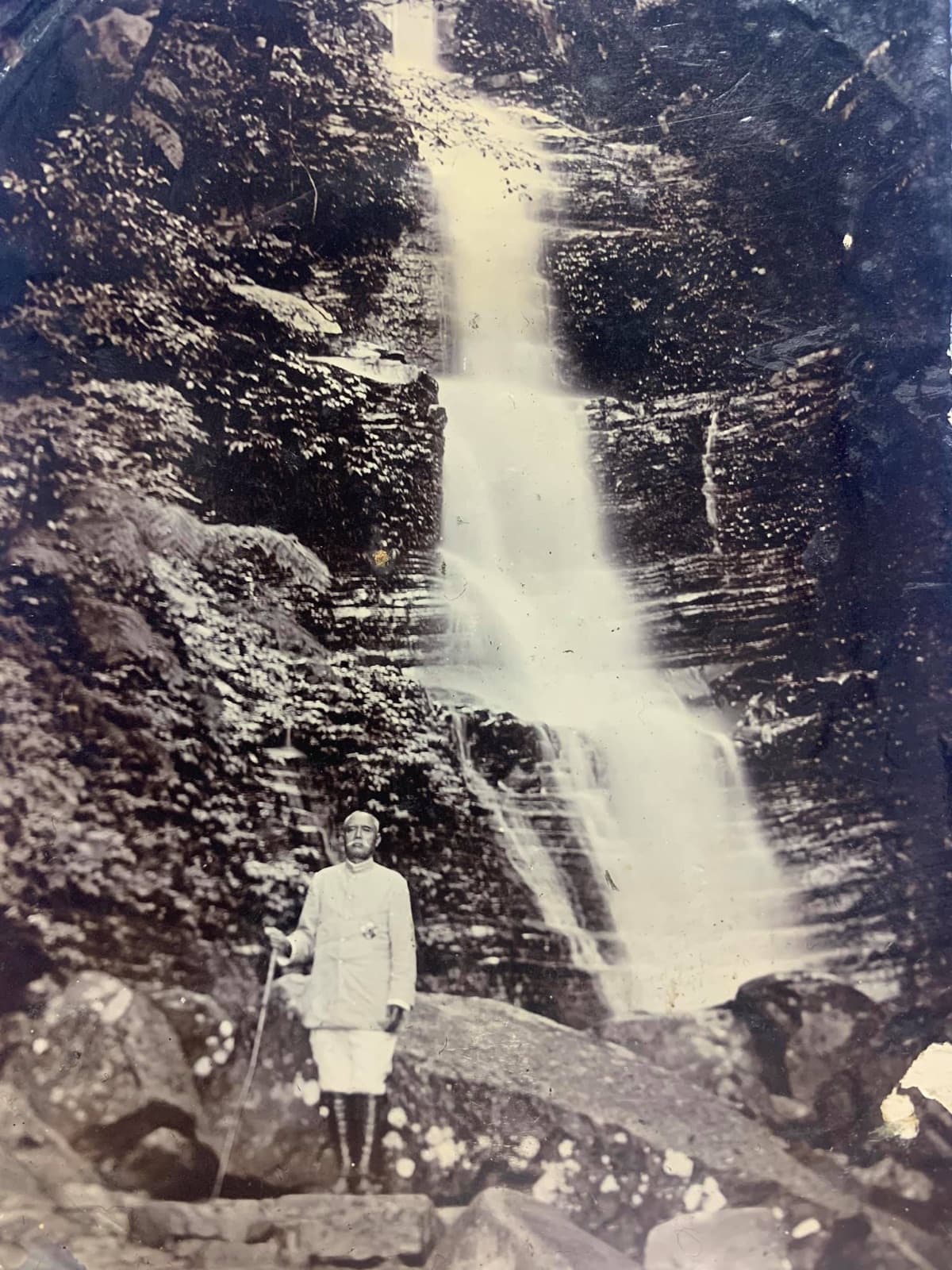 Governor-General Sakuma Samata standing before a waterfall near Tapung. His five-year plan for the mountains pushed the guard line deeper into the interior year by year.